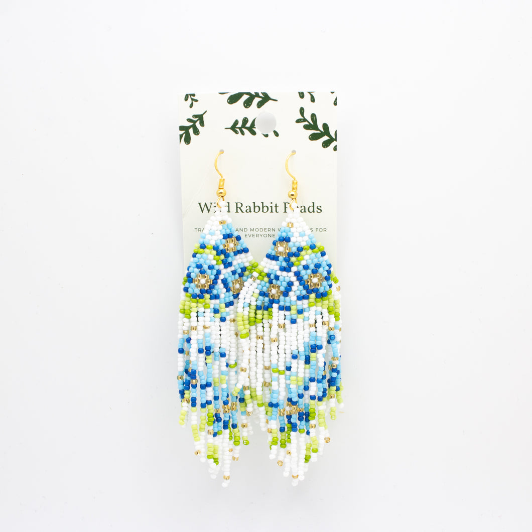 sky and dark blue flowers with green and white background, wide - beadwork earrings