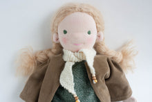waldorf doll with blonde braids