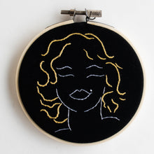 Marilyn Monroe on black - framed embroidery