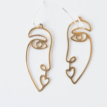 brass face earrings