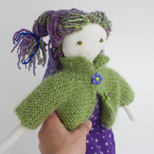 cloth doll with green and purple hair