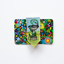 snake- embroidered brooch with painted background