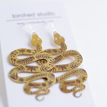 tattooed snake brass earrings