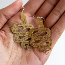 tattooed snake brass earrings